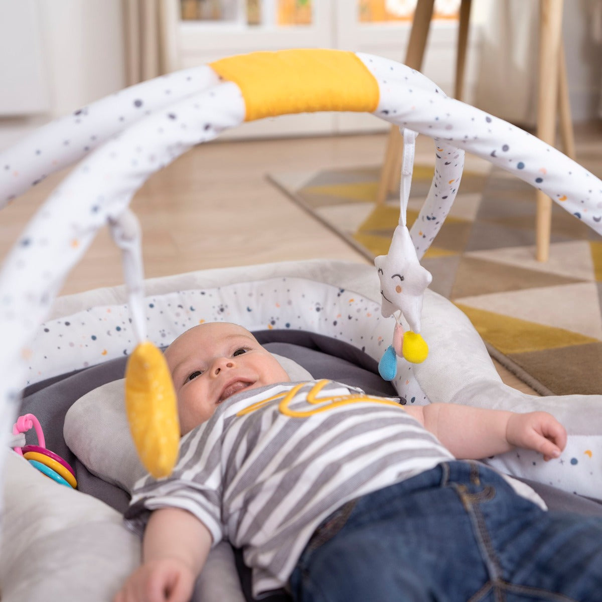 Badabulle Baby Plush Playmat Activity Gym with removable multisensory double arch - 50 x 40 x 23 Cm